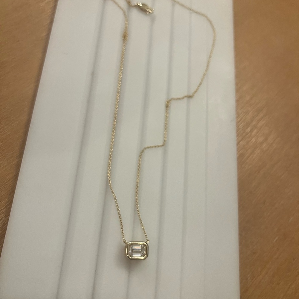 Bezel set 14k yellow gold 1 carat lab Diamond necklace.